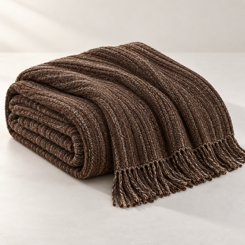 Celestia Sculpted Bed Throw, complete set on a quiet studio surface